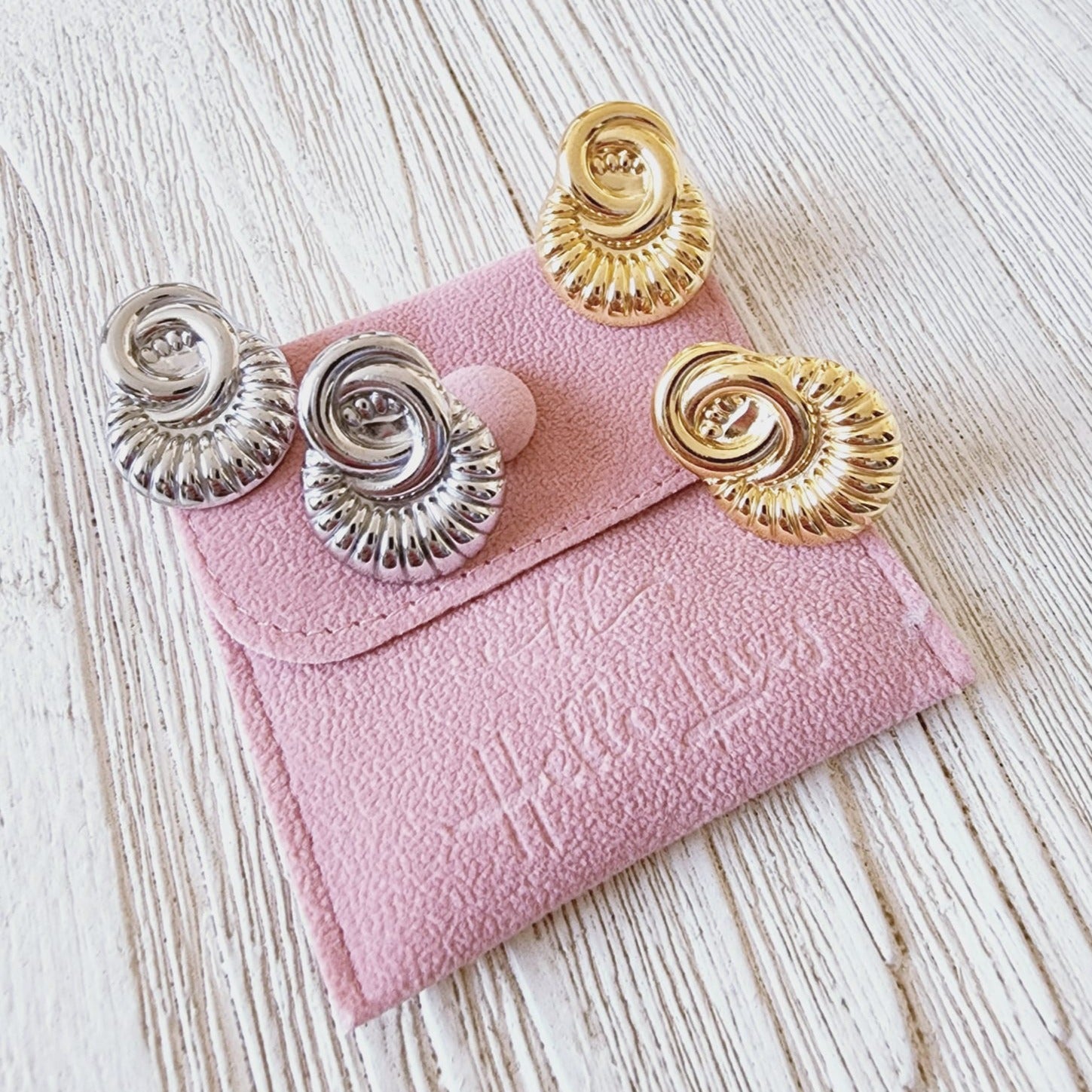 Shell Studs, silver studs, hypoallergenic earrings, Silver shell studs, 18k gold plated earrings, Waterproof earrings, Silver and gold, Durable earrings, Elegant earrings, Timeless design, aesthetic earrings, timeless earrings, Fashion accessories, Stylish jewelry, stylish earrings, Versatile jewelry, Special occasion jewelry, Everyday earrings, Premium quality studs, Affordable luxury, Hypoallergenic earrings waterproof earrings, water resistant earrings, silver studs, gold studs